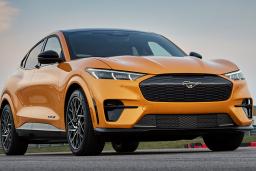 2022 Ford Mustang Mach-E GT driving in yellow